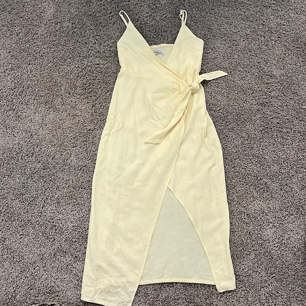 Soft yellow Urban Outfitters midi wrap dress!